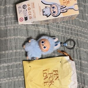 Labubu letter d keychain. Opened to verify.